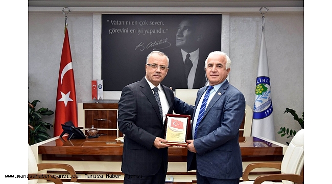 Muhtardan Başkan Kayda'ya plaketli teşekkür