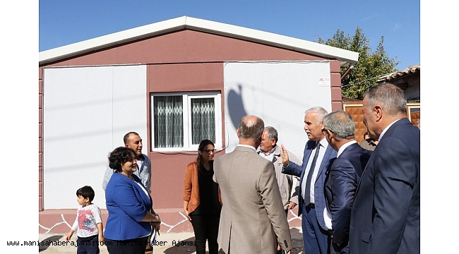 Saruhanlı'daki depremzedelerin yaraları sarılıyor