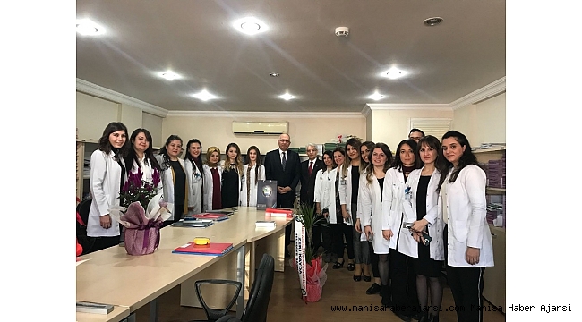 Başkan Kayda'dan meslektaşlarına çiçekli kutlama