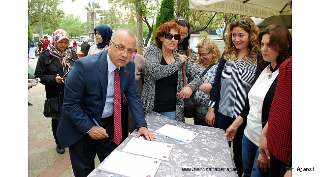 Salihli MHP'den çocuk istismarına karşı imza kampanyası