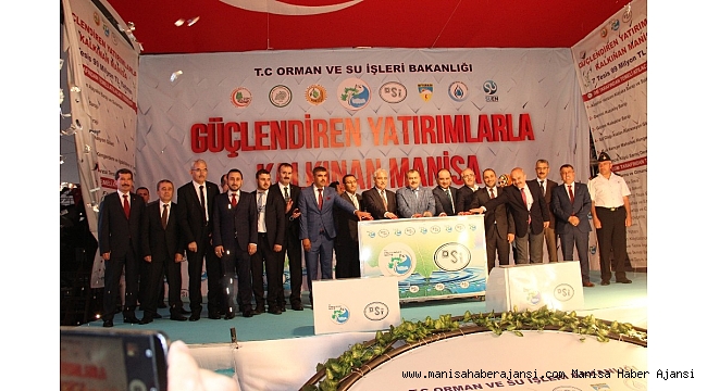 Bakan Eroğlu'nun katıldığı törende yağmur sürprizi