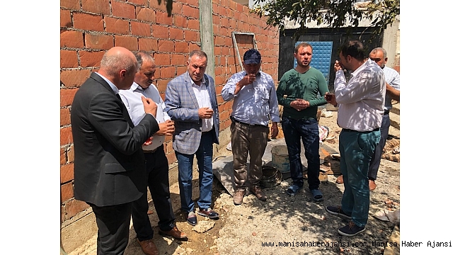 Manisa Büyükşehir evi yanan ailenin yanında