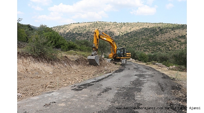 Manisa'da yol genişletme ve asfaltlama çalışması