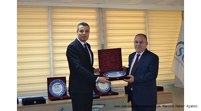 Sarıgöllü iş adamına plaket