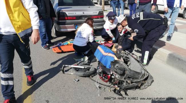 Manisa'da park halindeki otomobile çarpan bisikletli yaralandı