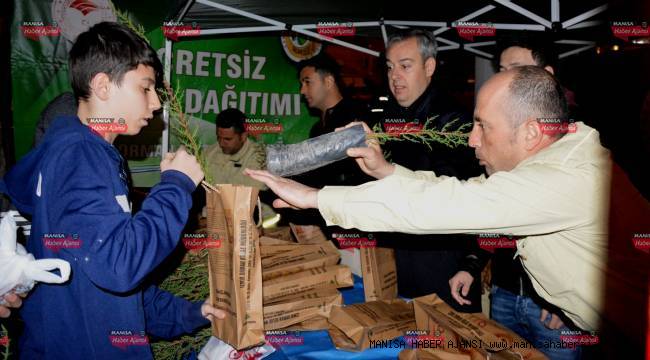 750 fidan ve 400 paket süt dağıtıldı