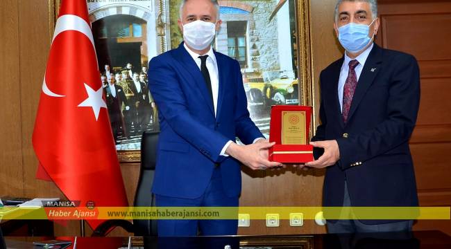 Mesleki eğitime katkı sağlayan Kadri Arslan’a plaket